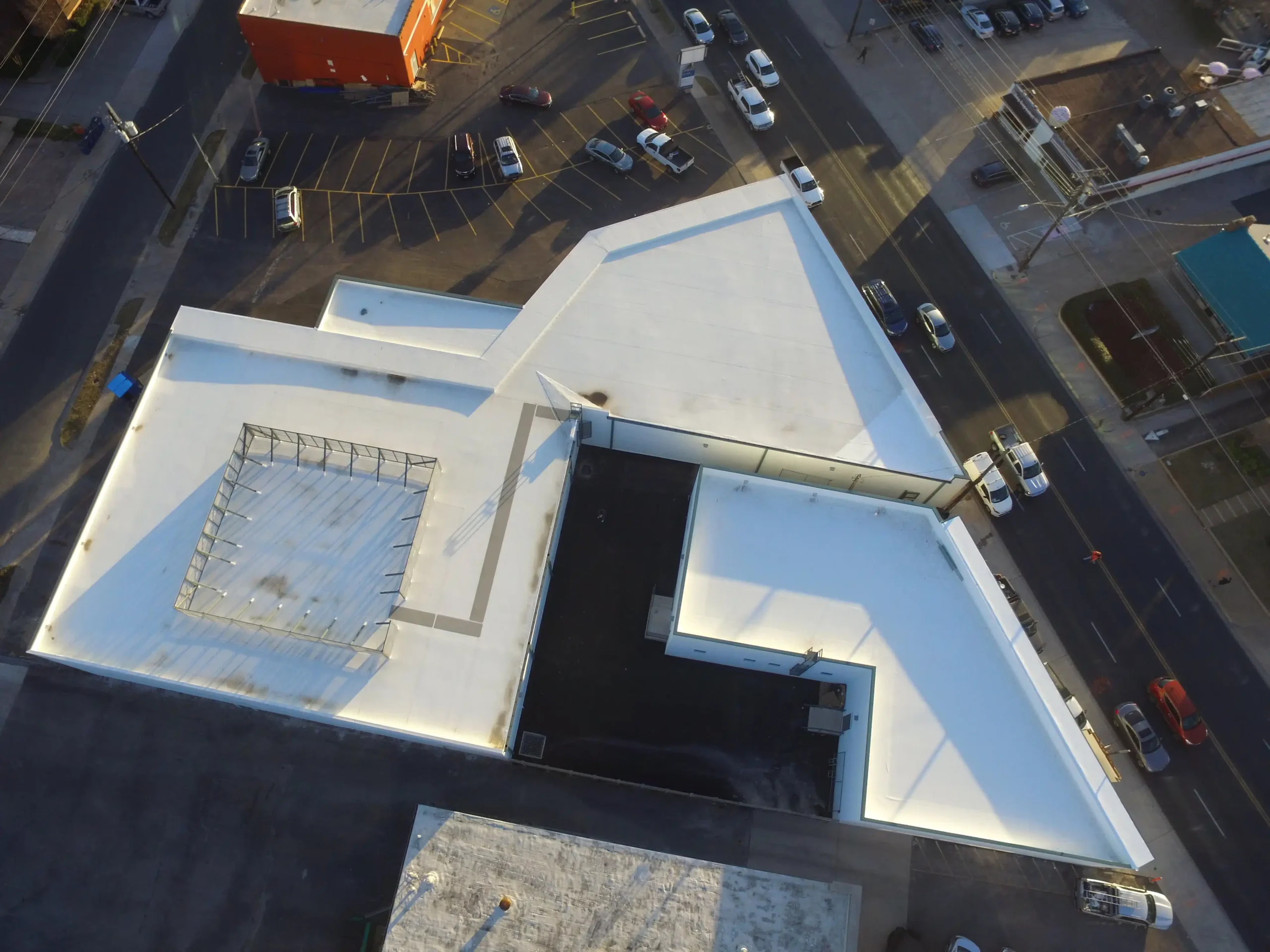 Aerial view of a coated commercial flat roof.